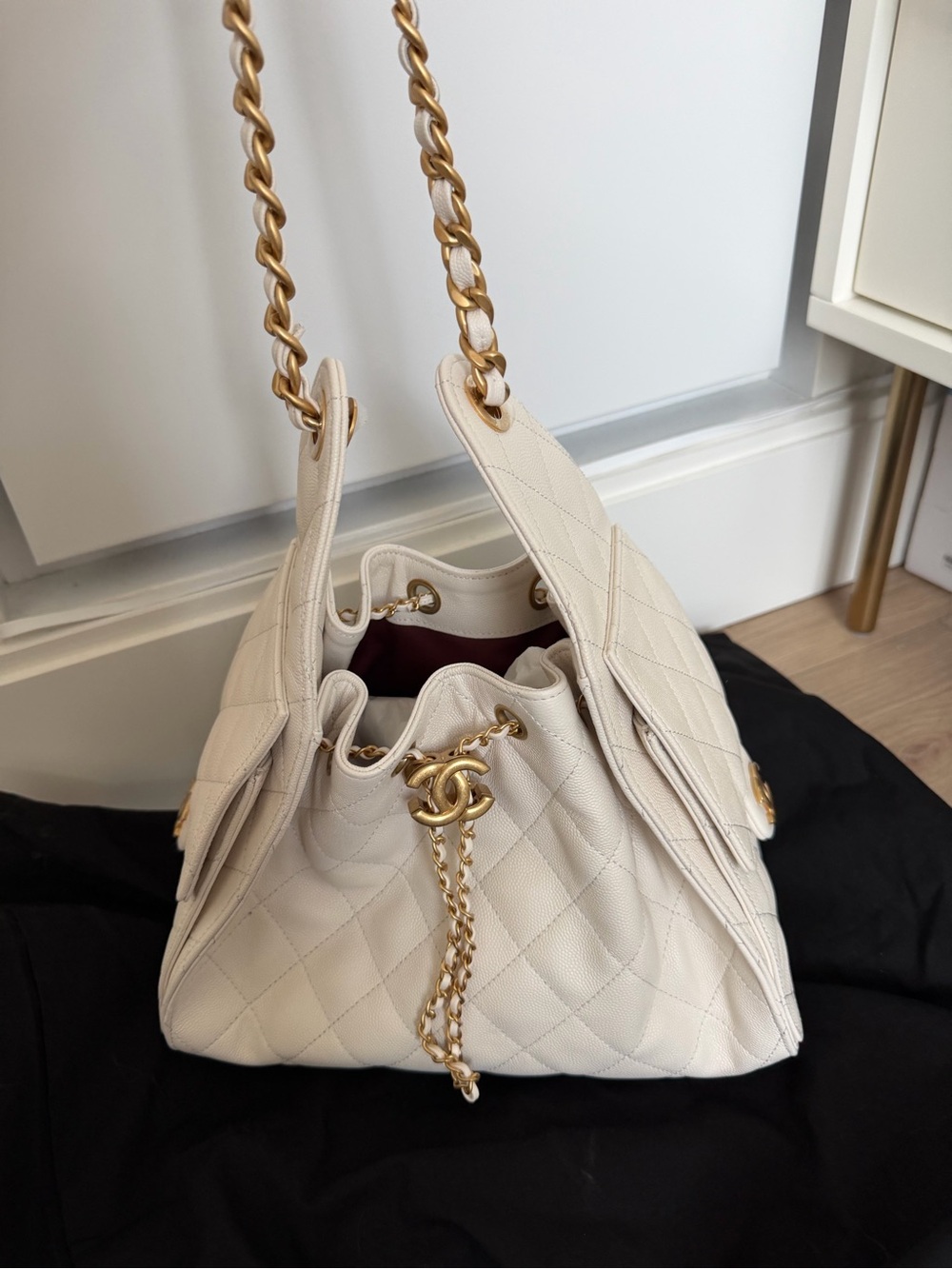 CHANEL 25 Cream Quilted Drawstring Shoulder Bag with Gold Hardware